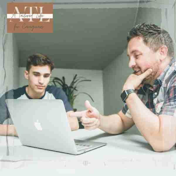 two men looking at a computer symbolizing where to find a mentor